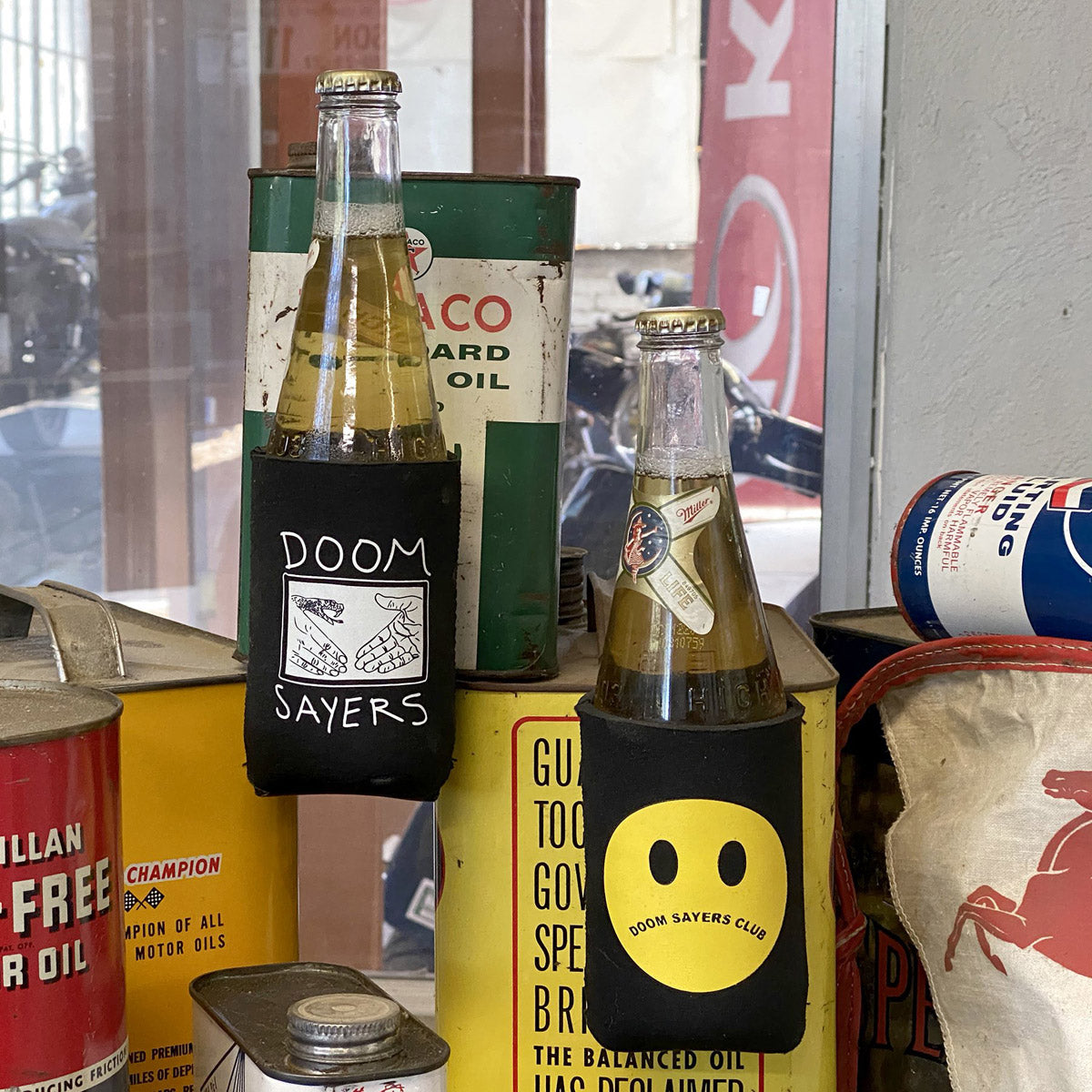DOOM SAYERS CLUB - UNHAPPY FACE MAGNETIC BEER COOZIE STUBBY HOLDER